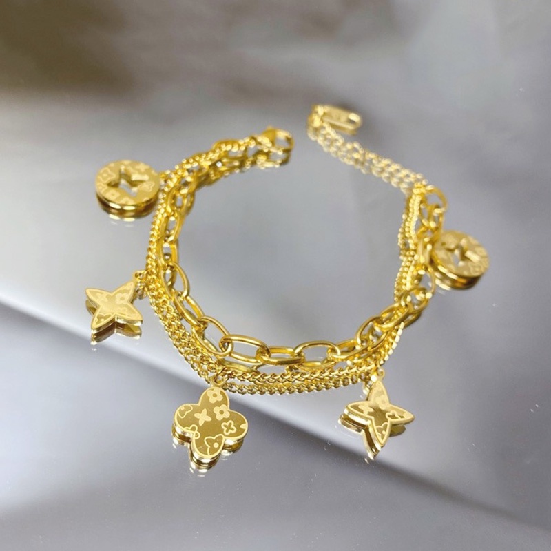 สี่ใบโคลเวอร์ สไตล์ใหม่ สร้อยข้อมือแฟชั่น อินเทรนด์ โซ่สองชั้น สี่ใบโคลเวอร์ สร้อยข้อมือ ระดับไฮเอนด์