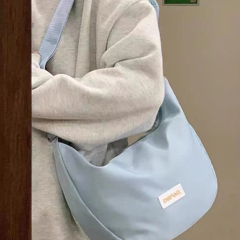 IELGY dumpling bag ญี่ปุ่นไนลอน messenger casual ความจุขนาดใหญ่กระเป๋าเกี๊ยวผ้าใบสําหรับผู้หญิง