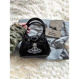 Empress Dowagers Portable Chain Bag 2023 Niche Design Saturn Mini Diagonal Bag Crocodile Pattern Patent Leather Bag