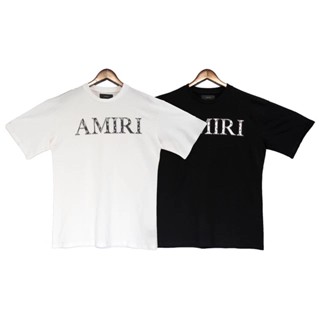 Amiri เสื้อยืดลําลอง แขนสั้น คอกลม พิมพ์ลายโลโก้ตัวอักษร ทรงหลวม แฟชั่นฤดูร้อน