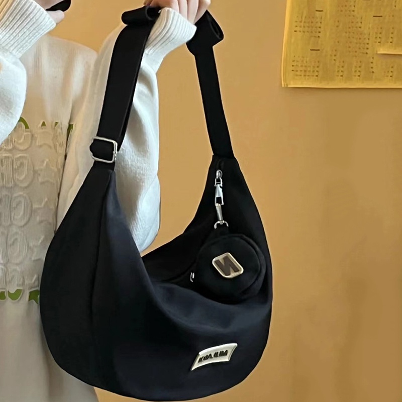 IELGY dumpling bag ญี่ปุ่นไนลอน messenger casual ความจุขนาดใหญ่กระเป๋าเกี๊ยวผ้าใบสําหรับผู้หญิง