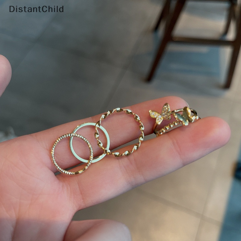 Dsth ชุดแหวนนิ้วมือแฟชั่น ทรงกลม ลายผีเสื้อ สีเงิน ปรับได้ เครื่องประดับ สําหรับผู้หญิง 4 ชิ้น