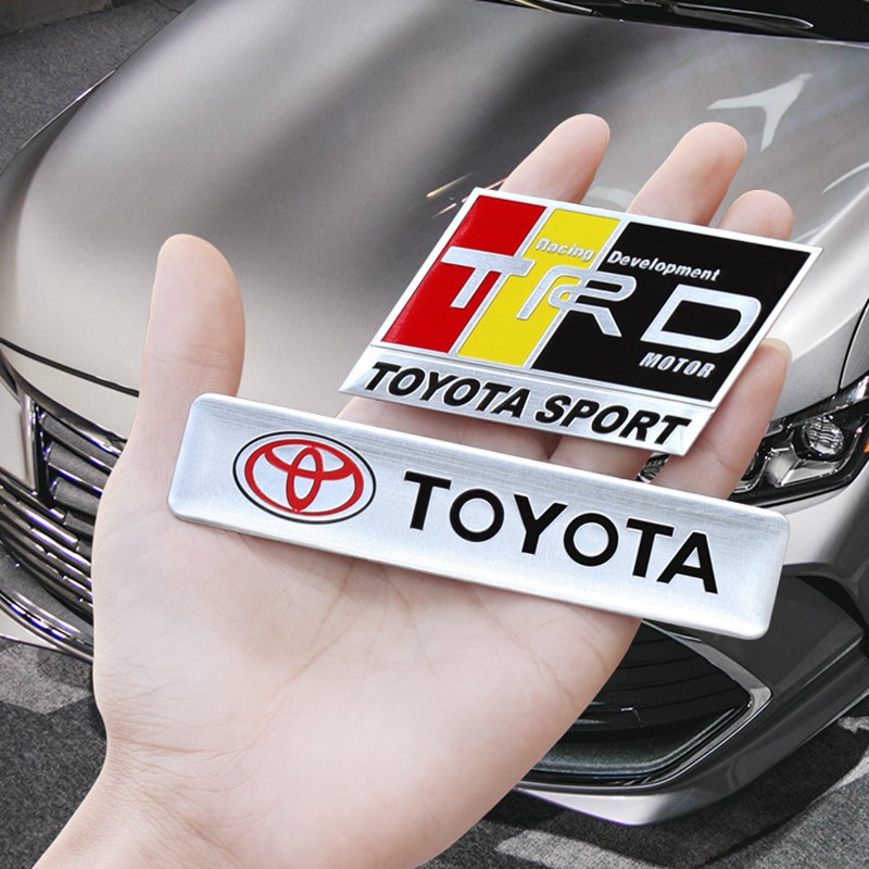 สติกเกอร์โลหะ สไตล์สร้างสรรค์ สําหรับตกแต่งรถยนต์ Toyota TRD Sports Vios Raize Wigo Rush Wish Corolla Cross Veloz Yaris Ativ Revo Etios Supra Innova