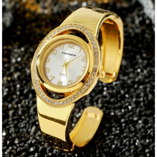 Cansnow สุภาพสตรีนาฬิกาควอทซ์หรูหรานาฬิกากําไลข้อมือสีทอง
