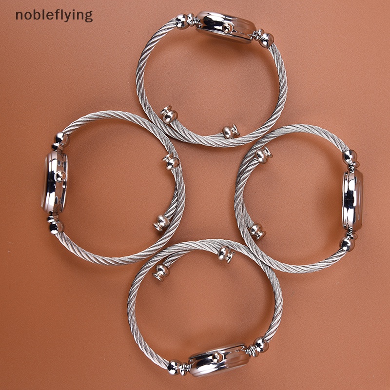 Nf นาฬิกาข้อมือควอทซ์ กําไลข้อมือ สีเงิน แฟชั่นสําหรับผู้หญิง นักเรียน 1 ชิ้น