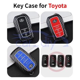 เคสรีโมตกุญแจรถยนต์ คาร์บอนไฟเบอร์ ABS พร้อมพวงกุญแจ สําหรับ Toyota Wildlander RAV4 Prado Levin Avalon Fortuner Yaris Camry Corolla Vios