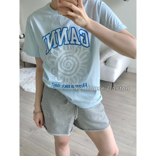 Ganni ใหม่ เสื้อยืดลําลอง แขนสั้น คอกลม พิมพ์ลายท้องฟ้า ทรงหลวม สีฟ้า