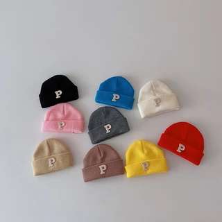หมวกบีนนี่ ผ้าวูลถักโครเชต์ แบบนิ่ม พิมพ์ลายตัวอักษร ให้ความอบอุ่น สีพื้น สําหรับเด็กทารกแรกเกิด อายุ 0-12 เดือน