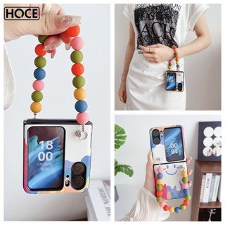 Hoce เคสโทรศัพท์มือถือหนัง ฝาพับ ลายหน้ายิ้ม พร้อมสายโซ่คล้อง ประดับลูกปัด หลากสี สําหรับ OPPO Find N2 Flip findn2flip