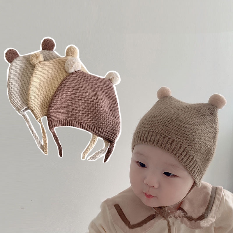 หมวกบีนนี่ ผ้าถักโครเชต์ แต่งปอมปอมคู่ สีพื้น ให้ความอบอุ่น แฟชั่นฤดูใบไม้ร่วง และฤดูหนาว สําหรับเด็กทารกแรกเกิด เด็กวัยหัดเดิน
