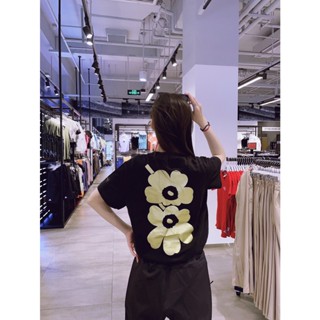 Marimekko เสื้อยืดคอกลม แขนสั้น ผ้าฝ้ายแท้ พิมพ์ลายดอกไม้ สําหรับผู้ชาย และผู้หญิง