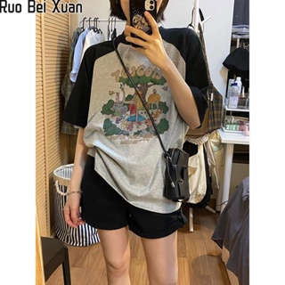 RUO BEI XUAN เสื้อยืดสตรีสไตล์เกาหลีใหม่จับคู่สี Raglan ไหล่พิมพ์หลวมแขนสั้นด้านบน