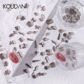 Koudan สติกเกอร์คริสตัลใส พลอยเทียม รูปผีเสื้อ เกล็ดหิมะ สีดํา สําหรับตกแต่งเล็บ DIY 100 ชิ้น