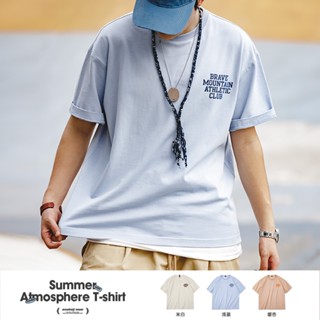 เสื้อยืดแขนสั้นลําลอง คอกลม ผ้าฝ้าย พิมพ์ลายตัวอักษร สีมาการอง แฟชั่นฤดูร้อน สไตล์อเมริกัน สําหรับผู้ชาย