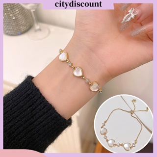 &lt;citydiscount&gt; สร้อยข้อมือ กําไลข้อมือ หินตาแมวเทียม แวววาว ปรับได้ สีทอง หรูหรา สามความรัก หัวใจ เสน่ห์ ผู้หญิง เครื่องประดับแฟชั่น