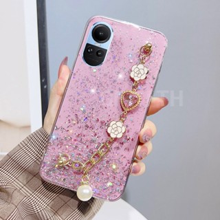 ใหม่ เคสโทรศัพท์มือถือแบบนิ่ม ใส แต่งกลิตเตอร์ ระยิบระยับ กันรอยเลนส์กล้อง ลายดอกคามิเลีย ท้องฟ้ากลางคืน พร้อมสายคล้องข้อมือ แฟชั่น สําหรับ Oppo Reno10 Reno 10 Pro 10 Pro+ 5G Reno10Pro Plus 2023