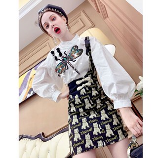 Single / suit loose shirt Design sense of dress Womens 2023 autumn new half skirt suspenders two-piece set