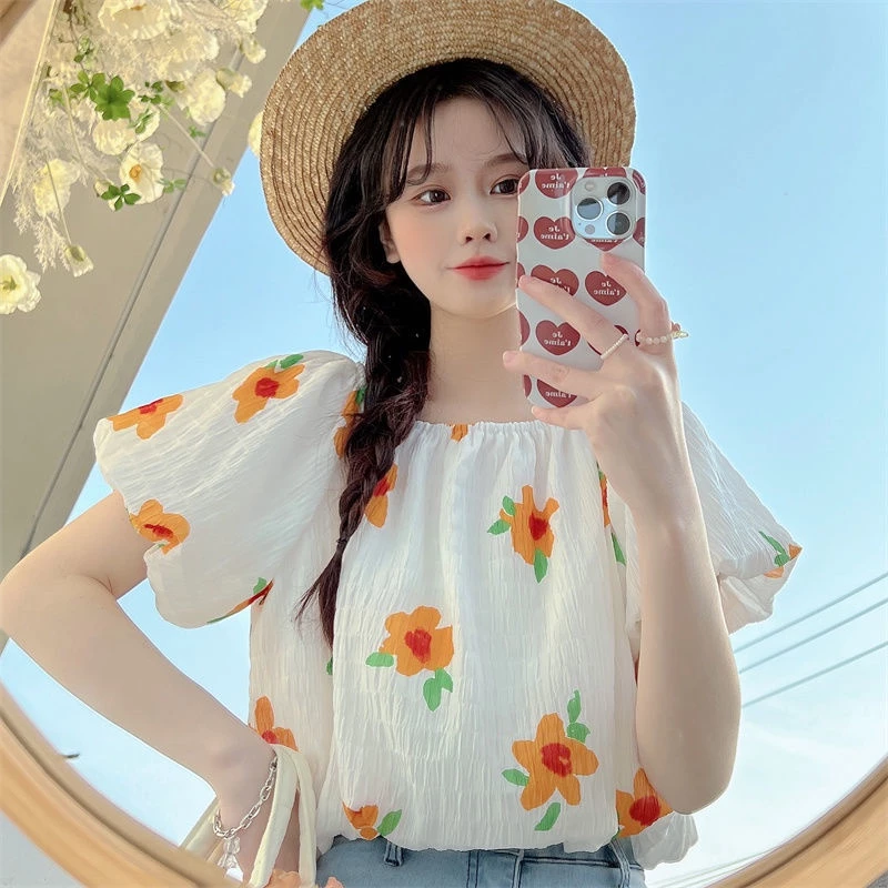 Bee เสื้อลายดอกแขนฟองแขนสั้นแฟชั่นผู้หญิง - รูปที่ 1