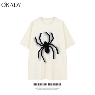 OKADY ผู้ชายแฟชั่นผ้าฝ้ายลายแมงมุมเสื้อยืดหลวมดูดซับเหงื่อ