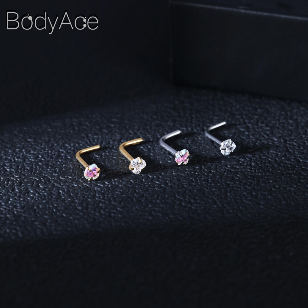 Bodyace 1 ชิ้น 0.8 / 1.0 มม. ลูกบาศก์เพทายจมูกกระดุมสแตนเลสรูปตัว L เจาะจมูกหัวใจดาวสี่เหลี่ยมเจาะรูจมูก