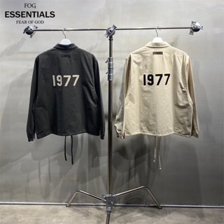 Fear Of God ESSENTIALS ของแท้ 100% เสื้อแจ็กเก็ตกันลม สไตล์โค้ช สําหรับผู้หญิง ผู้ชาย 1977