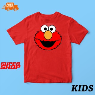 เสื้อยืดคอกลม พิมพ์ลายการ์ตูนอนิเมะ SESAME STREET ELMO FACE สวมใส่สบาย สไตล์ฮิปฮอป สุดเท่ สําหรับเด็กผู้ชาย และเด็กผู้หญิง