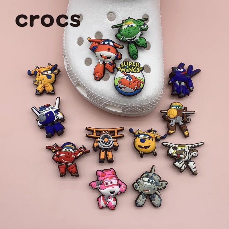 Crocs jibbitz Super Wings series หัวเข็มขัดรองเท้า Crocs charms รองเท้าแตะการ์ตูนสนุกกับการตกแต่งปากน่ารักสไตล์เกาหลีรูรองเท้าดอกไม้