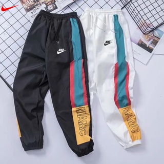 Nike ของแท้ 100% กางเกงวอร์ม ทรงหลวม พิมพ์ลาย สไตล์เกาหลี สตรีท สําหรับผู้ชาย คู่รัก