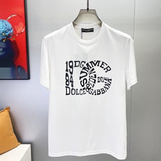 เสื้อยืดแขนสั้นลําลอง พิมพ์ลายโลโก้ DG แฟชั่นฤดูร้อน สําหรับผู้ชาย และผู้หญิง ไซซ์ XS - 3XL