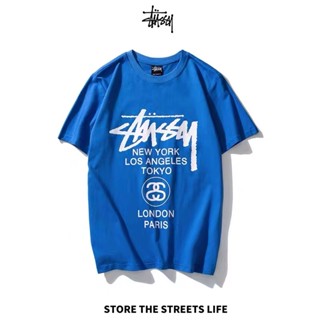 เสื้อยืดแขนสั้น ทรงหลวม พิมพ์ลาย Stuss Classic World Tour แฟชั่นคู่รัก