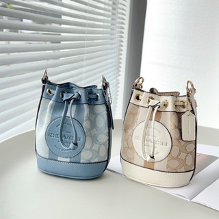 Mini Dempsey Bucket Bag C8322 ผ้าใบ กระเป๋าถังหูรูดสตรี COAC H กระเป๋าสะพายข้างใบเล็ก