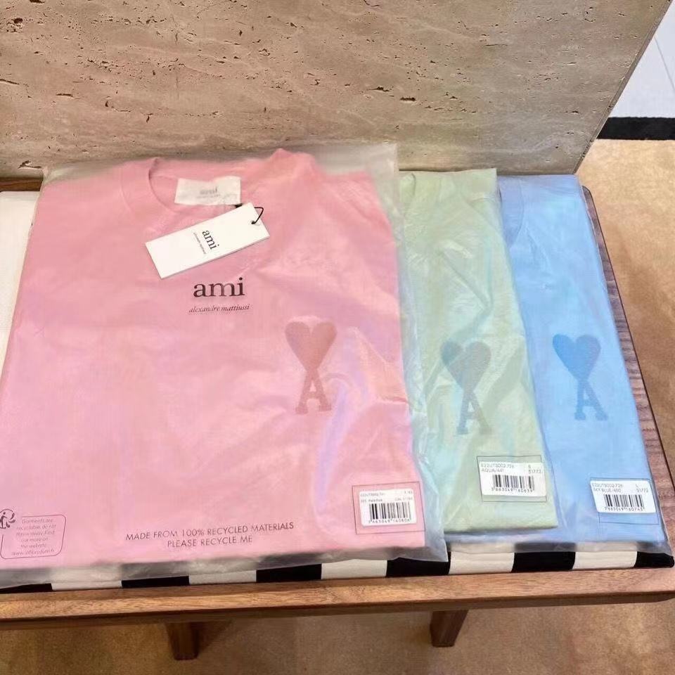 พร้อมส่ง เสื้อยืดแขนสั้น ผ้าฝ้าย 100% ปักลาย AMI สีมาการอง ทรงหลวม ขนาดใหญ่ สําหรับผู้ชาย และผู้หญิง
