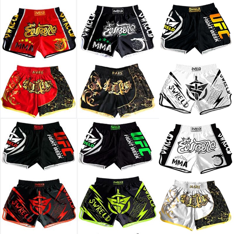 ใหม่ กางเกงชกมวย + กางเกงขาสั้นมวยไทย + กางเกงมวยไทย MMA Combat Fighting Fitness & UFC Competition สําหรับผู้ชาย และผู้หญิง