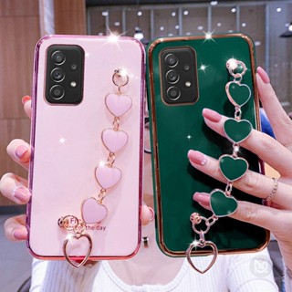 เคสโทรศัพท์มือถือ ซิลิโคนนิ่ม พร้อมสายคล้องข้อมือ จี้หัวใจ หรูหรา สําหรับ Samsung Galaxy M13 M23 M33 M53 M52 M51 M31