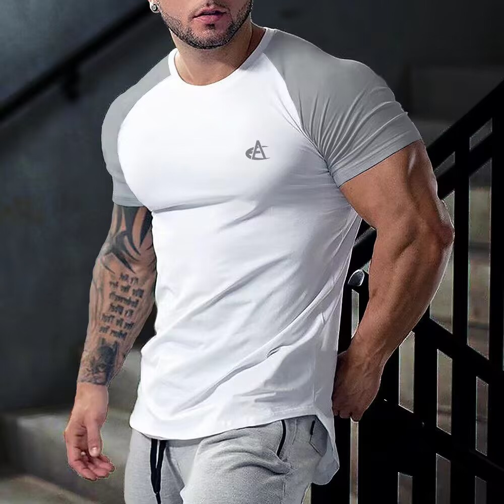 Mens Patchwork เสื้อยืดกล้ามเนื้อ Slim Fit Moisture Wicking Gym ออกกําลังกาย Tee สั้นแขนกุดฟิตเนสเพาะกายเสื้อยืด