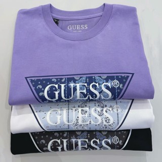 Guess เสื้อยืดคอกลม แขนสั้น พิมพ์ลายดอกไม้ โลโก้ ขนาดใหญ่ สําหรับผู้ชาย และผู้หญิง