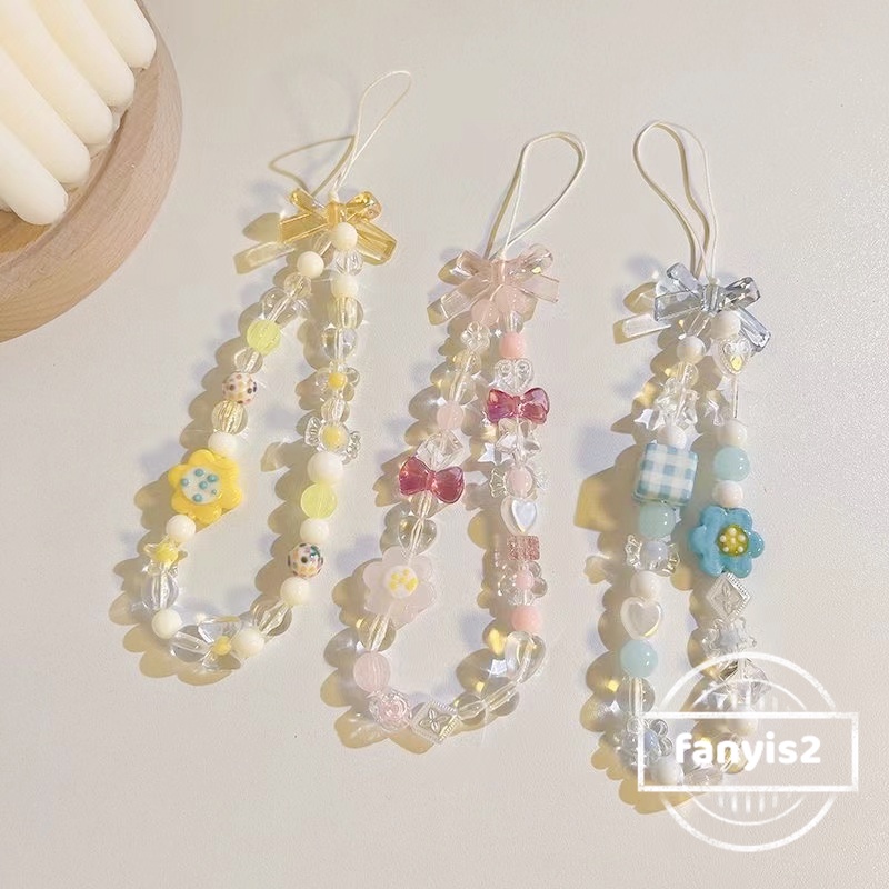 เคสโทรศัพท์มือถือ ประดับคริสตัล ลายดอกไม้ พร้อมสายโซ่คล้อง แบบพกพา สําหรับ iPhone