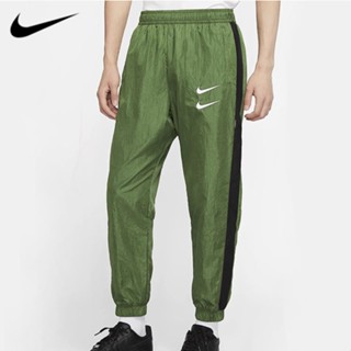 【พร้อมส่ง】ของแท้ 100% NIKE กางเกงกีฬา ปักลายโลโก้ ทรงหลวม แห้งเร็ว กันลม สําหรับผู้ชาย และผู้หญิง DD5125