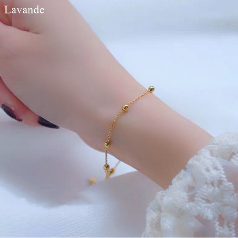 18K สร้อยข้อมือ ลูกปัดเหล็กไทเทเนียม ทอง 18K ทรงกลม กันน้ํา เรียบง่าย ของขวัญ สําหรับเด็กผู้หญิง