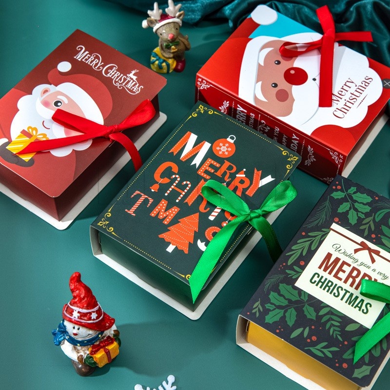 [แนะนํา] กล่องกระดาษ ทรงหนังสือคริสต์มาส / กล่องกระดาษช็อคโกแลต แอปเปิ้ล สุขสันต์วันคริสต์มาส / กล่องของขวัญคริสต์มาส ซานตาคลอส / อุปกรณ์ตกแต่งบ้าน / กล่องบรรจุภัณฑ์ขนม