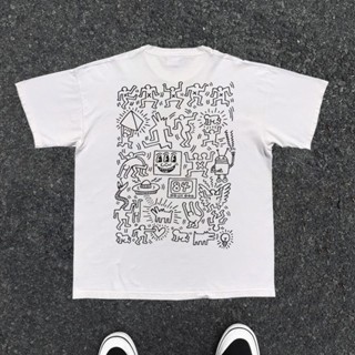 Chaopai Qingmei Keith Haring เสื้อยืดแขนสั้น ผ้าฝ้ายแท้ พิมพ์ลาย สไตล์ใหม่ สําหรับผู้ชาย