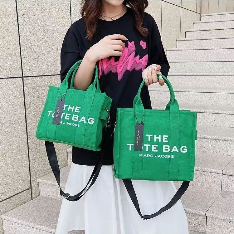 ใหม่ กระเป๋าสะพายไหล่ ผ้าแคนวาส ทรงโท้ท พิมพ์ลายตัวอักษร สไตล์ยุโรป และอเมริกา แฟชั่นสําหรับสตรี