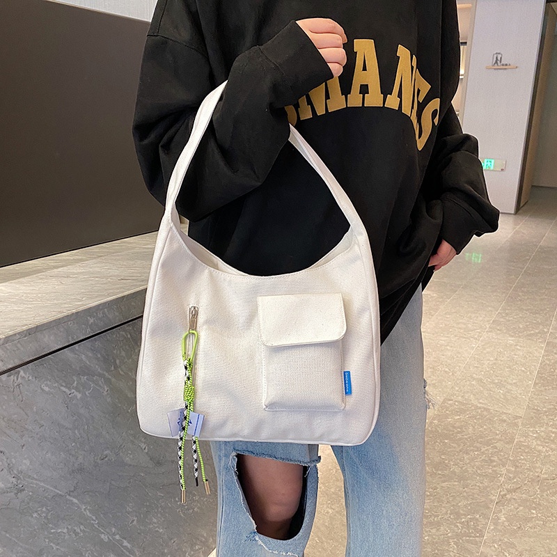 กระเป๋าสะพายไหล่ กระเป๋านักเรียน ผ้าแคนวาส ขนาดใหญ่ จุของได้เยอะ เข้ากับทุกการแต่งกาย สําหรับผู้หญิง และนักเรียน - รูปที่ 2