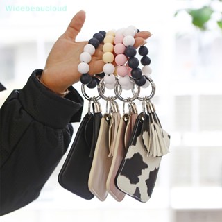 Widebeaucloud ซองหนัง สายคล้องข้อมือ สร้อยข้อมือ ลูกปัดซิลิโคน พวงกุญแจ กระเป๋าสตางค์ ปอมปอม พร้อมพู่ กําไลข้อมือ ที่ใส่บัตร ดี