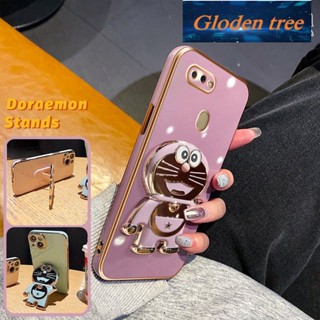 เคสโทรศัพท์มือถือ ชุบไฟฟ้า กันกระแทก ลายการ์ตูนโดราเอมอน พร้อมขาตั้งพับได้ สําหรับ OPPO A12 A12s A7 A5s A11k