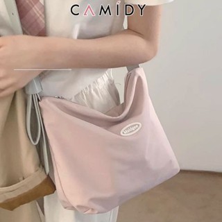 Camidy กระเป๋าผ้าใบลำลองนักเรียนผู้หญิงอินเทรนด์ใหม่เกาหลีสีตัดกันใต้วงแขนทั้งหมดตรงกับกระเป๋าหิ้วความจุขนาดใหญ่