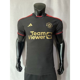 เสื้อกีฬาลําลอง ระบายอากาศ ทรงหลวม ลาย Manchester United 23-24 สีดํา สีทอง