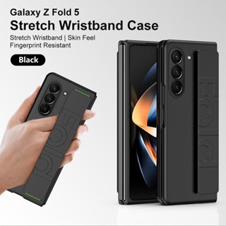 เคสโทรศัพท์มือถือ กันกระแทก พร้อมสายรัดข้อมือ สีมาการอง สําหรับ Samsung Galaxy Z Fold5 Z Fold5