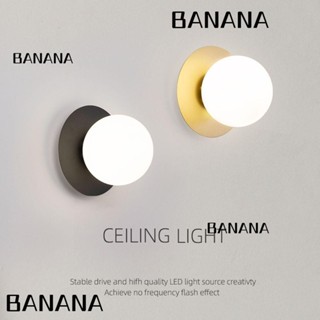 Banana1 โคมไฟติดผนัง LED สีดํา / ทอง