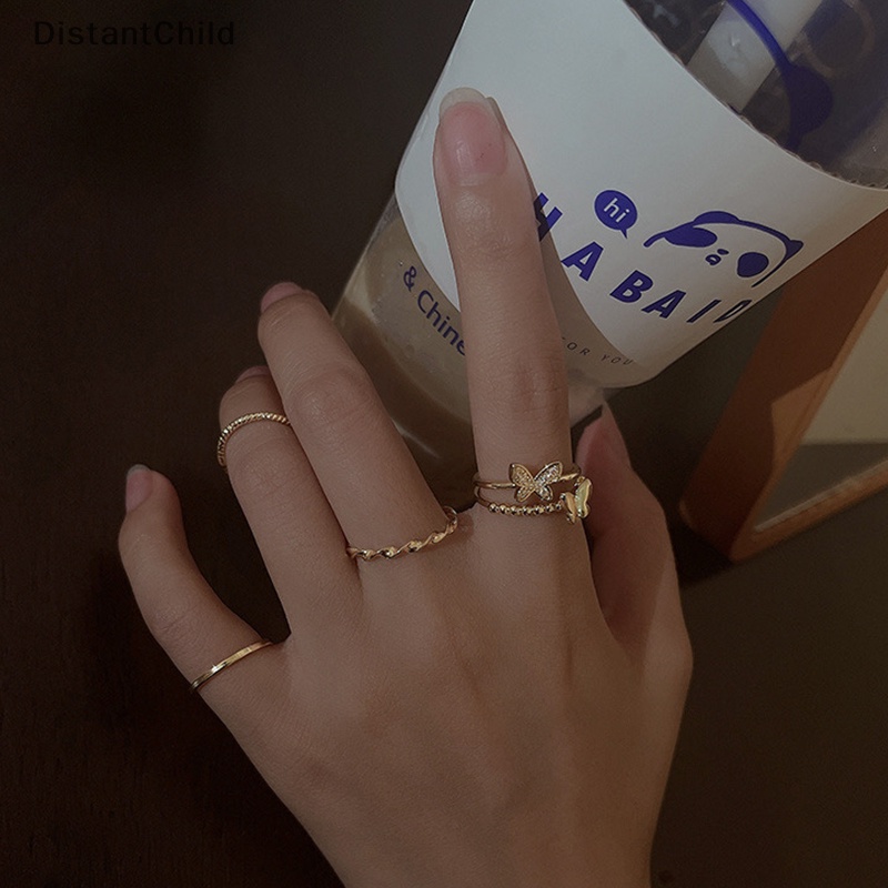 Dsth ชุดแหวนนิ้วมือแฟชั่น ทรงกลม ลายผีเสื้อ สีเงิน ปรับได้ เครื่องประดับ สําหรับผู้หญิง 4 ชิ้น
